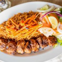 Lamb Tikka Kebab · Chunks of lamb marinated in fresh grated spices. Kebabs broiled over wood charcoal served wi...