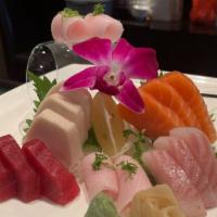 Sashimi Deluxe · Chef's special assortment with white rice on the side. Served with salad or soup.