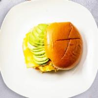 Avocado, Egg And Cheese Sandwich · Avocado, scrambled egg, and cheddar cheese served on a bread.