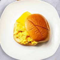 Egg And Cheese Sandwich  · Scrambled egg, and cheddar cheese served on a bread.