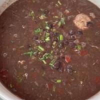 Sopa Negra (Black Bean Soup) · Black Bean Egg Drop Soup served with a side of White Rice.
