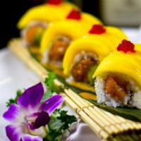 Amazing Roll · Spicy crunchy tuna and avocado inside, topped with mango and tobiko.