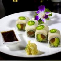 Passion Roll · Salmon, avocado and cucumber inside, topped with white tuna, garnished with thinly sliced ja...