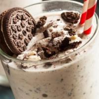 Oreo Milkshake · Vanilla ice cream, crushed oreo and milk. Topping: whipped cream, sprinkles.
