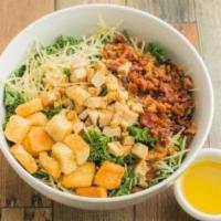 Kale Salad · 32 oz. Baby kale, bacon bits, diced chicken, shredded parmigiano, croutons, yogurt caesar dr...