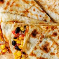 Create Your Own Quesadilla · Choice of your wrap, cheese, 3 toppings.