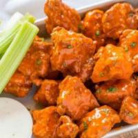 Boneless Wings · Served with celery and carrot, blue cheese, buffalo sauce. Hand-breaded boneless wings serve...