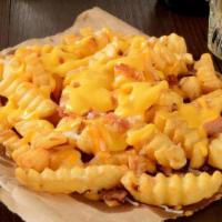 Mild Cheddar Cheese Bacon Fries · 