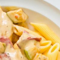 Gluten-Free Penne Alfredo Pasta · Prepared fresh daily-penne topped with your choice of homemade alfredo sauce, chicken alfred...