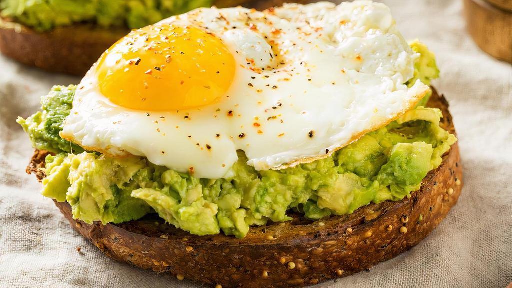 Avocado Toast With Fried Egg · 2 Sliced 8-grain bread with Avocado pure and 1 fried egg