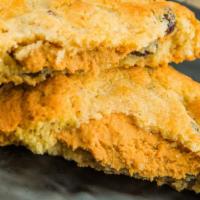 Cranberry-Oat Peanut Butter Cookies · Brown sugar cookie with cranberries and oat; peanut butter filling.