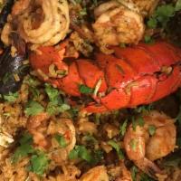 Plato Del Mar / Sea Platter · Special. Pescado entero, camarones, almejas y ostras / whole fish, shrimp clams & scallops.