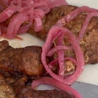 Chuletas / Pork Chops · Chuleta de cerdo cocinada a tu estilo / Pork chops