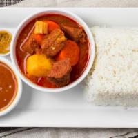 Beef Stew · Carne de res guisada. served with rice and beans or fried green or yellow plantains or frenc...
