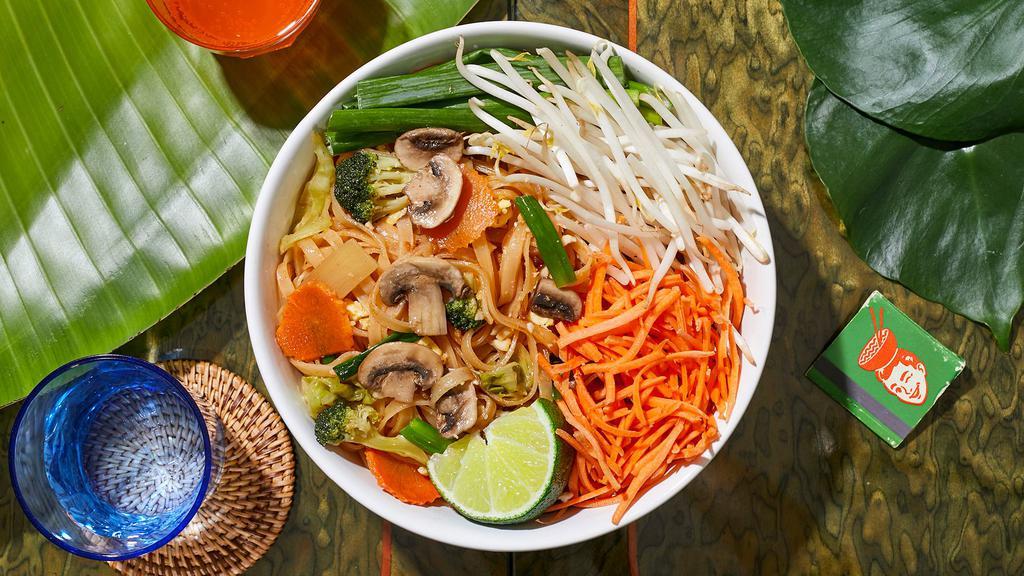 Vegetable Pad Thai · Stir-fried rice noodles with mixed vegetables, scallions, bean sprouts, scrambled egg, and crushed peanuts.