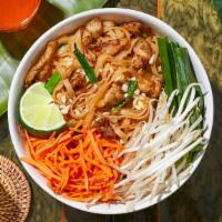 Pork Pad Thai · Stir-fried rice noodles with pork, scallions, bean sprouts, scrambled egg, and crushed peanu...