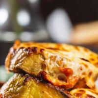 Grilled Eggplant · Mozzarella, pecorino and tomato sauce.