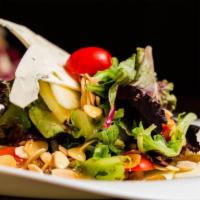 Tre Colori Salad · Arugula, endive, radicchio, olive oil, Gorgonzola cheese, walnuts and balsamic vinaigrette.