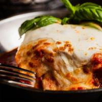 Baked Lasagna · Ricotta cheese, mozzarella, Parmesan cheese and Bolognese sauce.