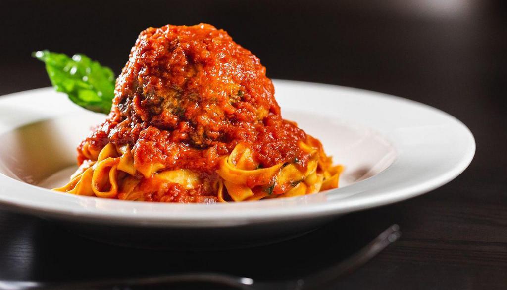 Spaghetti Meatballs · Classic tomato sauce and basil.