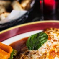 Eggplant Parmigiana - To · Mozzarella, Pecorino cheese, tomato sauce & spaghetti