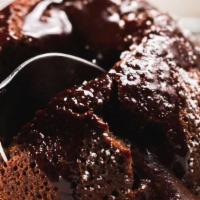 Chocolate Lava Cake · Semi-sweet chocolate, melted center Served with Vanilla Ice cream.