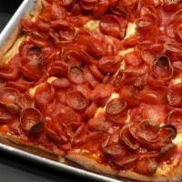 Lou Lou’S Spicy Pepperoni Pizza · Mini peps, fresh mozzarella cheese, fresh tomato sauce, and square deep dish pizza.