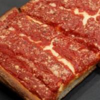 Sicilian Red Pizza · Sauce is on the bottom and cheese is on the top.