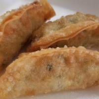 Mandoo · Fried dumplings (Veggie or Chicken)
Served with Asian Vinegar