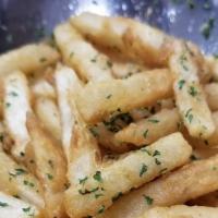 Truffle Fries · tossed with white truffle oil and parsley