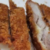 Chicken Katsu · Fried chicken cutlet.
Battered with Japanese Panko Breadcrumbs