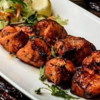Chicken Tikka · Chicken cubes, marinated overnight in traditional spice and grilled. Served with fresh mint ...