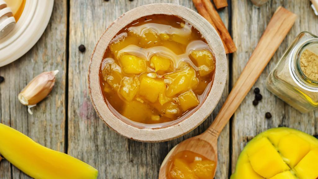 Mango Chutney · Sweet spice cut mango chutney.