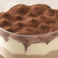 Tiramisu · The ultimate Italian goodness with baked ladyfingers dipped in coffee, layered with a whippe...
