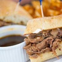French Dip · Grilled sliced roast beef melted mozzarella on a toasted garlic hero served with au jus grav...