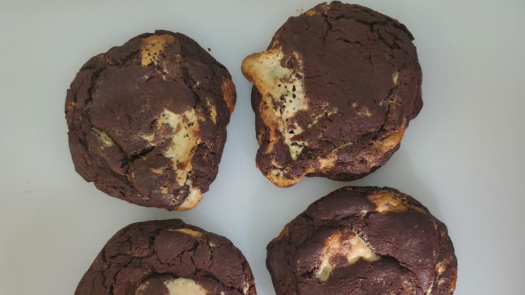 Chocolate Halva Cookie · Soft core dark chocolate cookie with chunks of halva