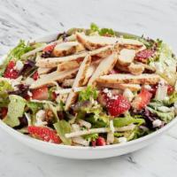 Grilled Chicken And Strawberry Salad · Mixed green lettuces topped with wood grilled chicken, strawberries, goat cheese, jicama, Sa...
