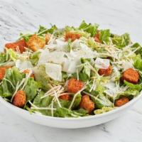 Caesar Salad · Crispy romaine lettuce topped with shaved parmesan and chili-dusted croutons, house-made Cae...