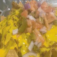 Nachos · camarones y mixto
shrimp and mixed