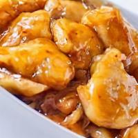 Orange Chicken · tasty orange chicken (white meat) lightly battered and fried to perfection served with our o...