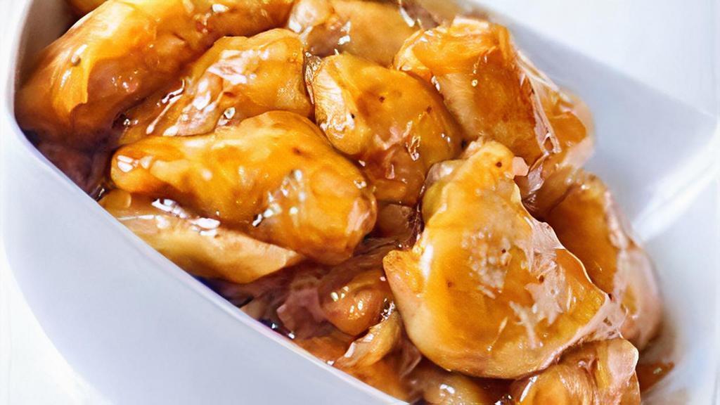 Orange Chicken · tasty orange chicken (white meat) lightly battered and fried to perfection served with our own sweet sour sauce.  everyone's favorite.