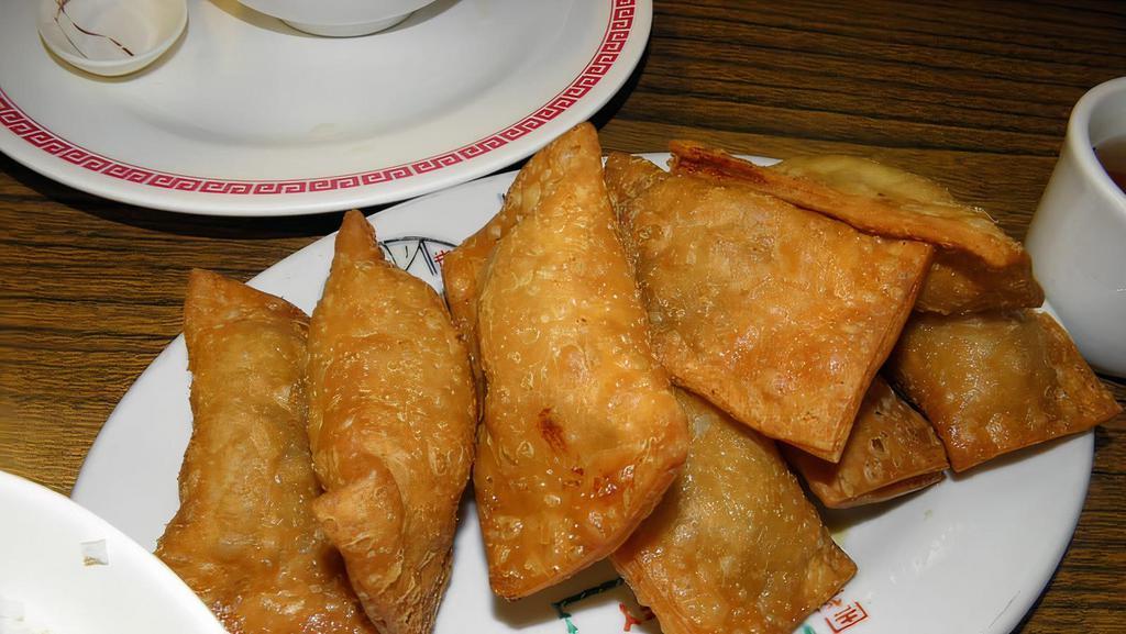 Crispy Gau Gee · 8 pieces of deep fried gau gee stuffed with pork served with our own special sweet sour sauce.