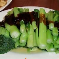 Choy Sum With Garlic Or Oyster Sauce · a favorite among the locals, select garlic or oyster sauce.   picture is oyster sauce version.