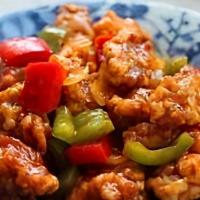 Sweet & Sour Pork · lightly battered and deep fried pieces of pork sauteed with pineapple, bell peppers and our ...