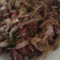 Mongolian Beef · tender slices of beef sauteed with white onion and spicy sauce