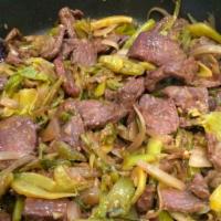 Beef With Sour Cabbage · tender beef slices sauteed with tasty sour cabbage.