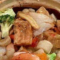 Seafood Tofu Casserole · scrumptious seafood combination of shrimp, squid, fish, scallop, and fried tofu and vegetabl...