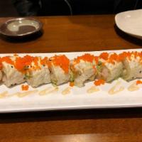 Rock Shrimp Tempura Roll · Comes with avocado and flying fish roe. Rolled with soy bean sheet.