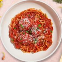 S&M Pasta · Al dente spaghetti in our house made garlic marinara sauce paired with meatballs and topped ...