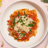 Vodka Valentine Pasta · Creamy pink tomato vodka sauce made to order cooked with Fettuccine.